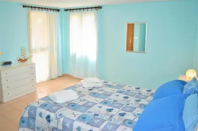 Letto o letti in una camera di Casa Vacanze Mameli