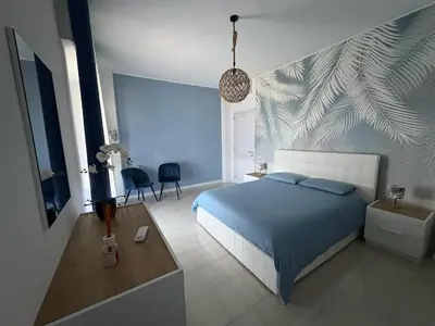 Letto o letti in una camera di La Dimora di zia Franca