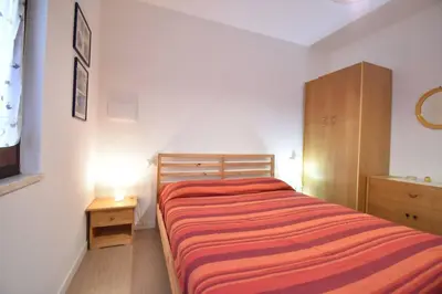 Letto o letti in una camera di Casa Vacanze Il Bouganville