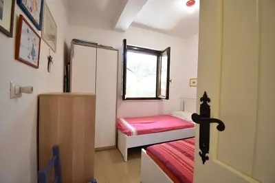Letto o letti in una camera di Casa Vacanze Il Bouganville