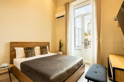 Letto o letti in una camera di Garzia Rooms - Dimora Storica