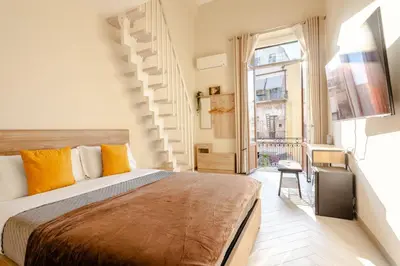 Letto o letti in una camera di Garzia Rooms - Dimora Storica