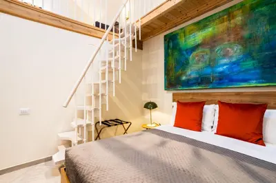 Letto o letti in una camera di Garzia Rooms - Dimora Storica