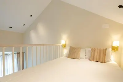Letto o letti in una camera di Garzia Rooms - Dimora Storica