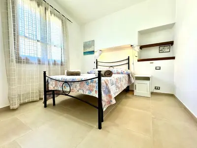 Letto o letti in una camera di Beach Houses