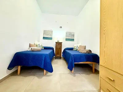 Letto o letti in una camera di Beach Houses