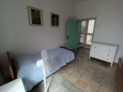 Letto o letti in una camera di Casa dei pescatori sulla laguna