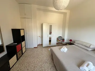 Letto o letti in una camera di Via Roma House appartamento