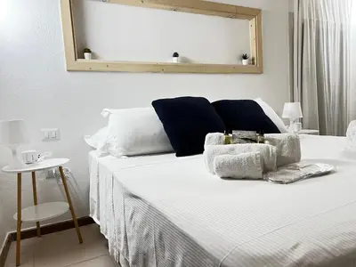 Letto o letti in una camera di Casa Dedè nel centro storico di Cagliari