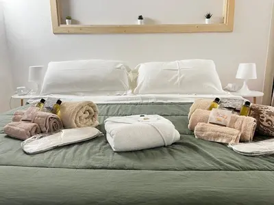 Letto o letti in una camera di Casa Dedè nel centro storico di Cagliari