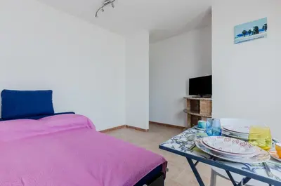 Letto o letti in una camera di GuestHost - Sisters Home and Suite!