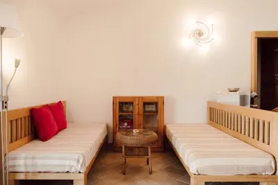 Letto o letti in una camera di Terrazza sul mare - Villa Alisei
