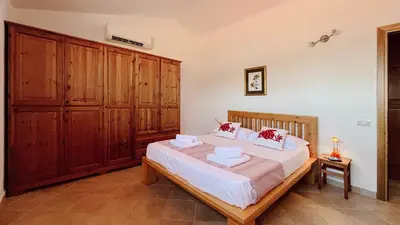 Letto o letti in una camera di Terrazza sul mare - Villa Alisei