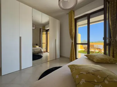 Letto o letti in una camera di AgoRa Family House