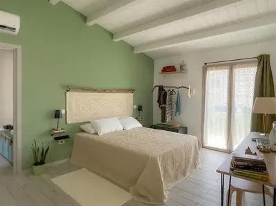 Letto o letti in una camera di IS PUDDAS de Monica GuestHouse
