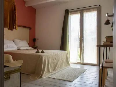 Letto o letti in una camera di IS PUDDAS de Monica GuestHouse