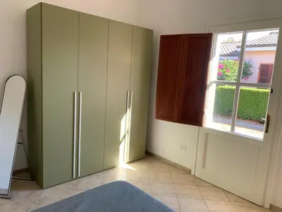 Letto o letti in una camera di Casa vacanza Mamaioa