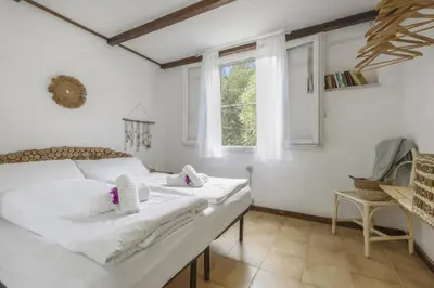 Letto o letti in una camera di Villa La Scuderia I Unique Beachfront Villa