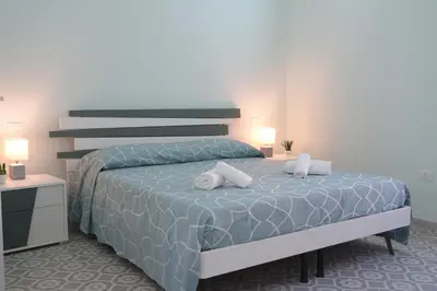 Letto o letti in una camera di B&B Aquas