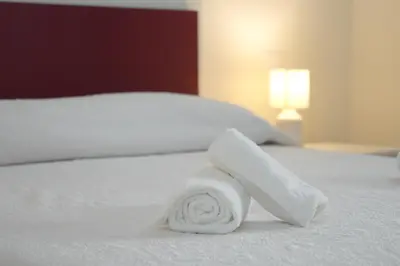 Letto o letti in una camera di B&B Aquas