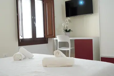 Letto o letti in una camera di B&B Aquas