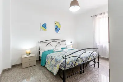 Letto o letti in una camera di Sa Omu de Virgiliu - Affitti Brevi Italia