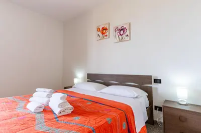 Letto o letti in una camera di Sa Omu de Virgiliu - Affitti Brevi Italia