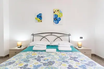 Letto o letti in una camera di Sa Omu de Virgiliu - Affitti Brevi Italia