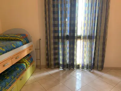 Letto o letti in una camera di Casa vacanze Da Daniela