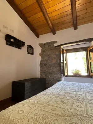 Letto o letti in una camera di Osini Ecciu Home