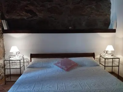 Letto o letti in una camera di Osini Ecciu Home