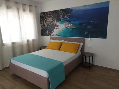 Letto o letti in una camera di Abba e Sole