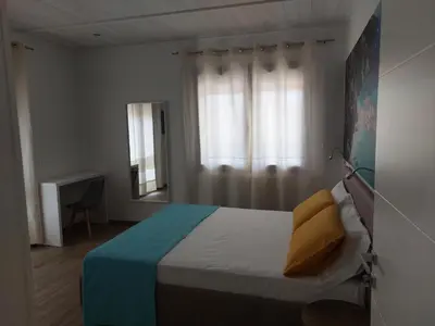 Letto o letti in una camera di Abba e Sole