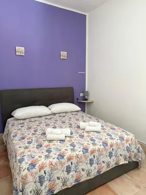 Letto o letti in una camera di Dream House