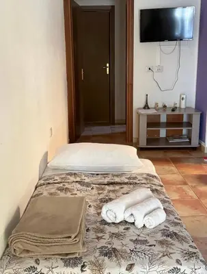 Letto o letti in una camera di Dream House