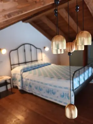 Letto o letti in una camera di Il Giardino Fiorito