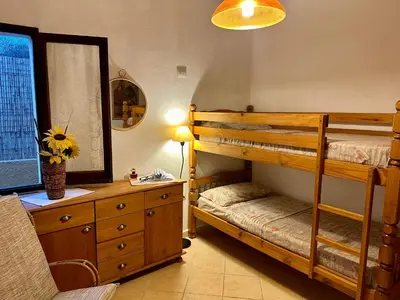 Letto o letti in una camera di Villa Rosanna