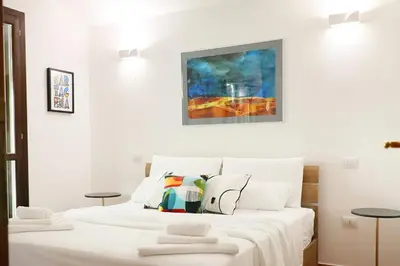 Letto o letti in una camera di Bella Vita 300m dalla spiaggia