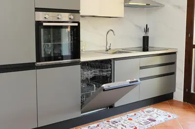 Cucina o angolo cottura di Bella Vita 300m dalla spiaggia