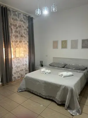 Letto o letti in una camera di Casa A