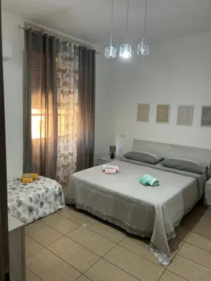 Letto o letti in una camera di Casa A