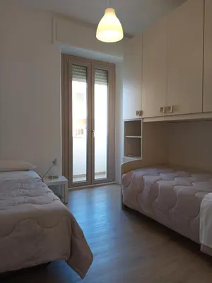 Letto o letti in una camera di LorMar House
