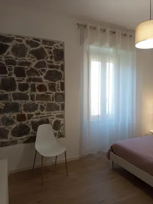 Letto o letti in una camera di LorMar House