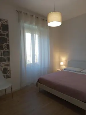 Letto o letti in una camera di LorMar House