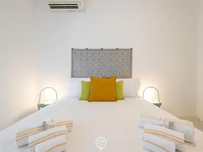 Letto o letti in una camera di Modern Mameli Apartment