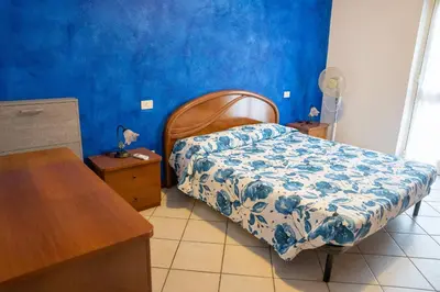 Letto o letti in una camera di La Casa del Sole e della Luna