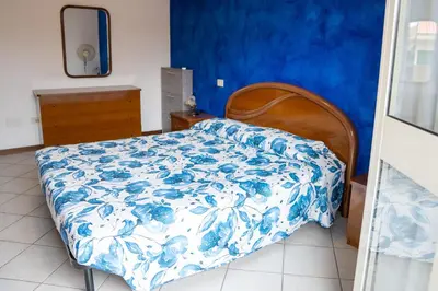 Letto o letti in una camera di La Casa del Sole e della Luna