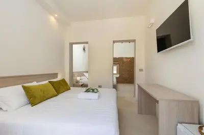 Letto o letti in una camera di Ausèntu Guest House