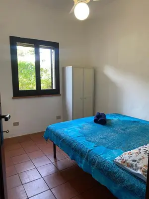 Letto o letti in una camera di Villa Roberta