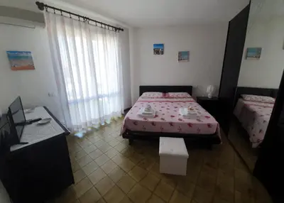 Letto o letti in una camera di Su Foghile